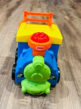 Fisher-Price Colorful Blue & Yellow Push Train with Green Front